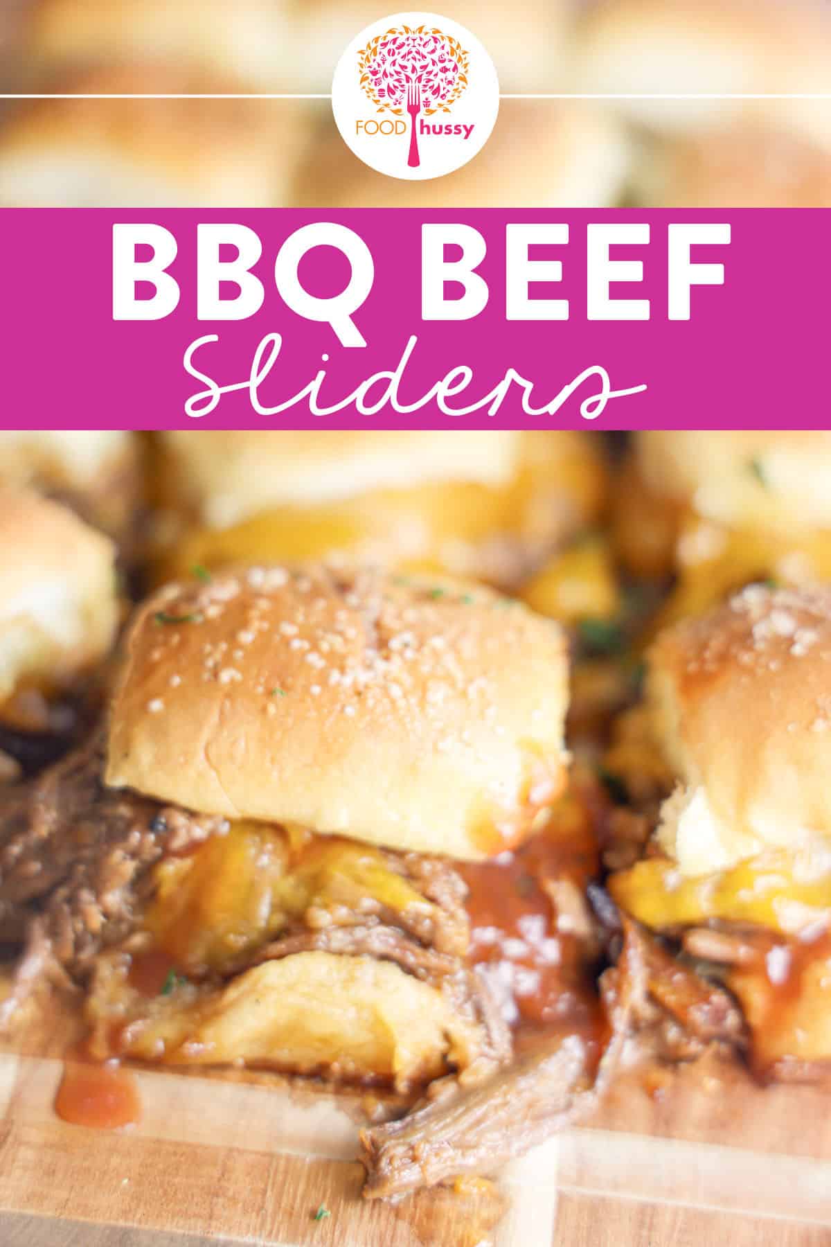 BBQ beef sliders are loaded with tender, juicy shredded beef smothered in rich, smoky barbecue sauce and melty cheese served on soft mini buns. These bite-sized delights pack a flavorful punch perfect for any gathering. via @foodhussy