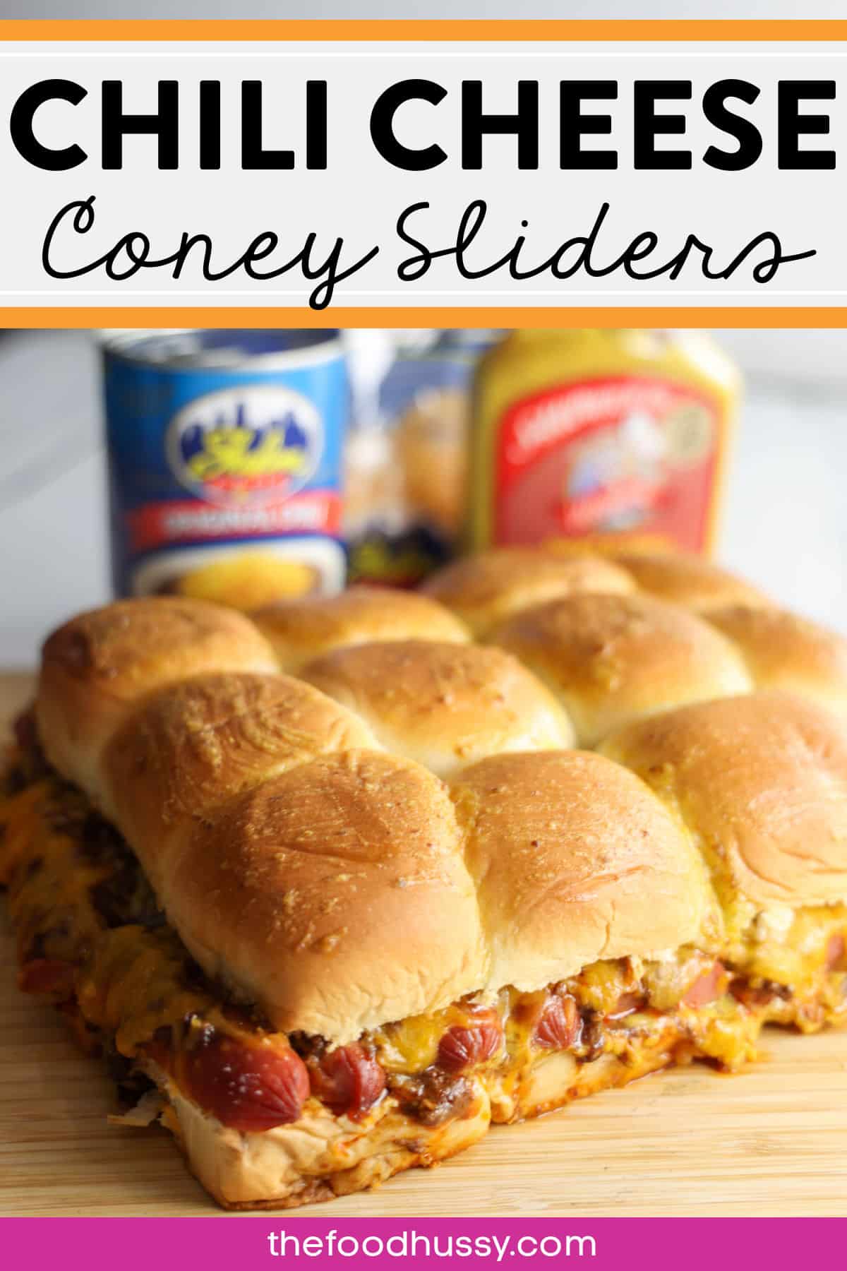 Chili Cheese Coney Sliders are going to be your new game day favorite! Bonus: if you're a Cincinnati Bengals fan - they're made for you! Slider buns topped with hot dogs, Cincinnati chili, mustard, onions and - of course - Cheddar cheese. These are messy, melty and oh so good!!!! via @foodhussy