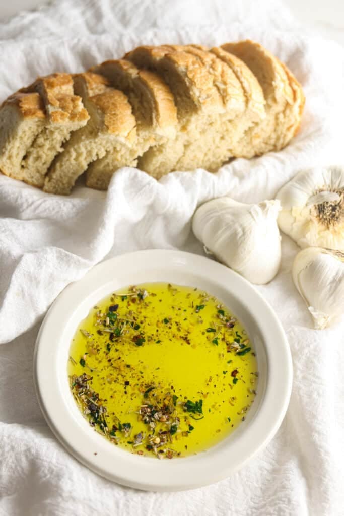 Carrabba's Bread Dipping Oil with Italian herbs and olive oil served with warm bread