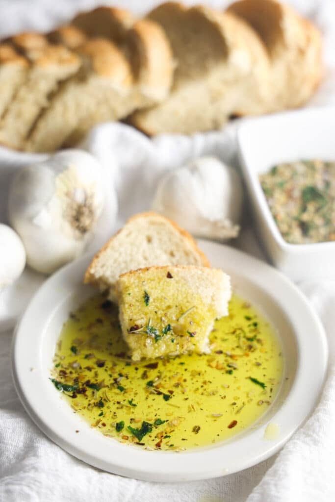 Carrabba's Bread Dipping Oil with Italian herbs and olive oil served with warm bread