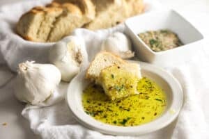 Carrabba's Bread Dipping Oil with Italian herbs and olive oil served with warm bread