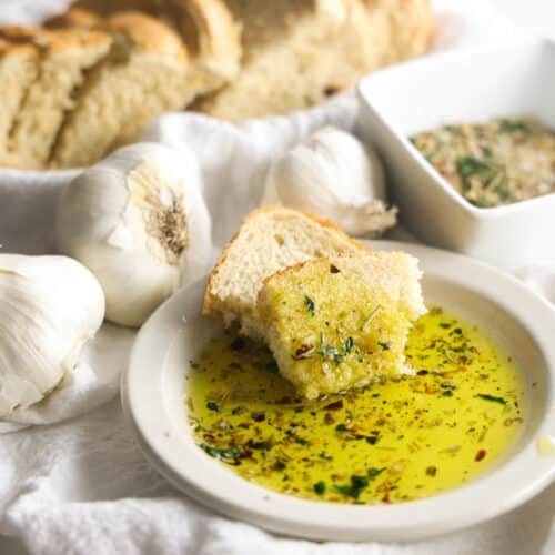 Carrabba's Bread Dipping Oil with Italian herbs and olive oil served with warm bread