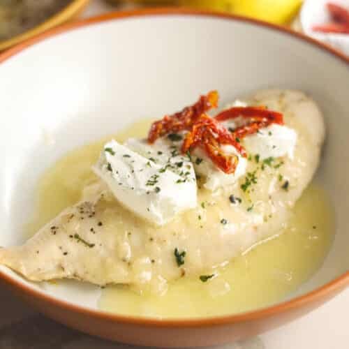 Carrabba's Chicken Bryan with goat cheese, sun-dried tomatoes, fresh basil and lemon butter sauce
