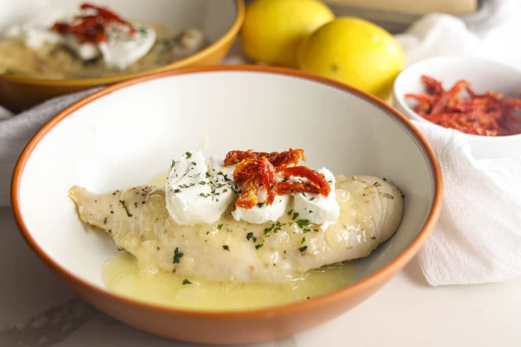 Carrabba's Chicken Bryan with goat cheese, sun-dried tomatoes, fresh basil and lemon butter sauce