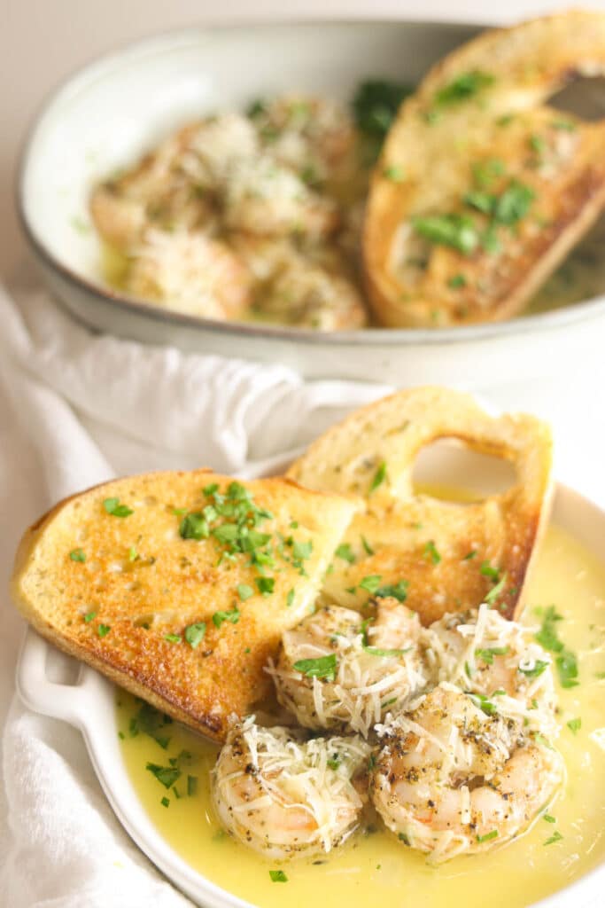 Copycat Carrabba's Shrimp Scampi served with garlic toast for dipping in lemon butter sauce