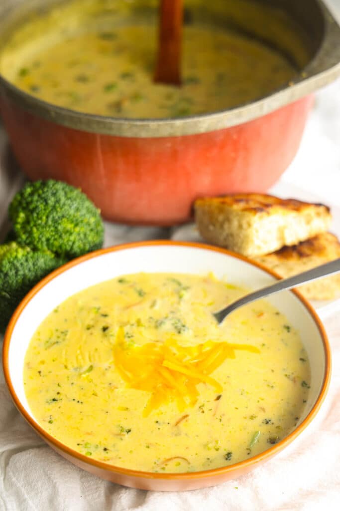 Copycat Panera Broccoli Cheddar Soup served with crusty bread