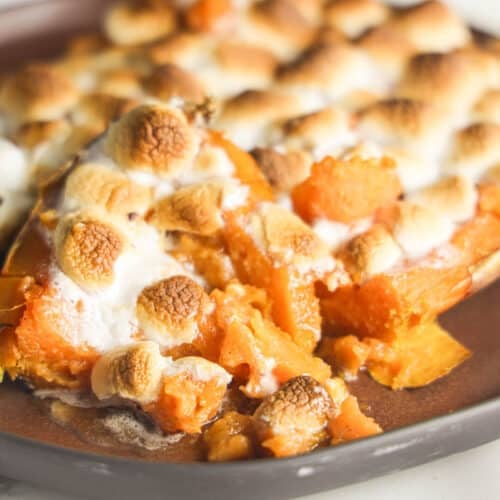 Texas Roadhouse loaded sweet potatoes topped with caramel sauce and toasted mini marshmallows.
