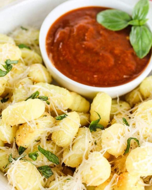 Air Fryer Gnocchi is such a delicious surprise! You will love these little crunchy pillows of yum – especially when they’re tossed in garlic and Parmesan cheese and dipped in your favorite marinara sauce. #airfryer #gnocchi #airfryerrecipes #recipeoftheday #recipeshare