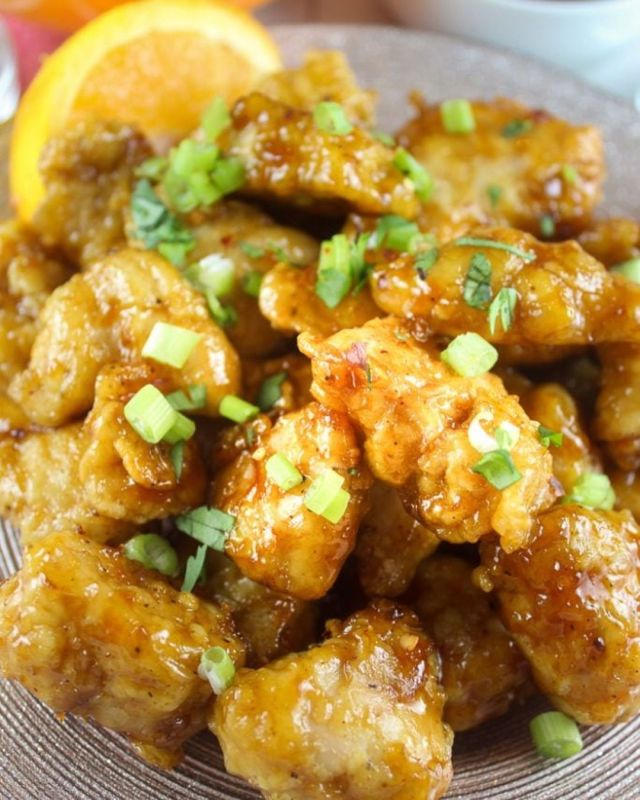 Air Fryer Orange Chicken is crispy with a delicious citrus flavor! It’s a really quick dish to make and making it in the air fryer was a snap. So skip the takeout and make this sweet & savory dish at home! #orangechicken #carryout #recipes #howto #cookingathome