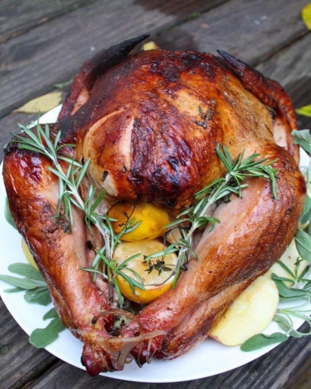 This Traeger Smoked Turkey is juicy, tender, slightly smoky and so easy to make! This Traeger turkey recipe will definitely make sure your dinner makes the holiday newsletter! #turkey #thanksgiving #recipes #traeger #howto #foodblogger