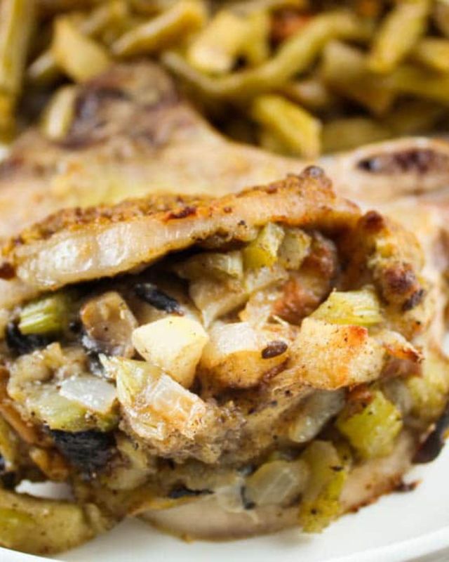 Air Fryer Stuffed Pork Chops go from fridge to table in less than 30 minutes and the stuffing has that wonderful bite of fall with diced apple! Using your air fryer ensures you’ll have juicy pork chops with tenderness in every bite! #porkchops #stuffedpork #airfryer #recipes #easymeals #dinnerideas #foodblogger #viral #fyp