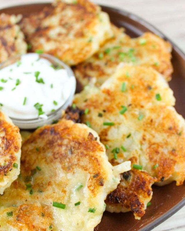 These White Cheddar Cheese Potato Pancakes are great for St. Patrick’s Day or any time of the year! A great way to use leftover mashed potatoes, these potato pancakes are great as a side dish for dinner or a new take on hash browns for breakfast! #potatopancakes #stpattysday #foodisfun #recipeshare #recipeoftheday #fyp