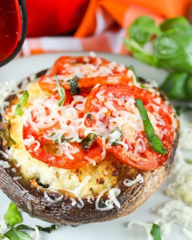 These Air Fryer Stuffed Portobello Mushrooms are the perfect entree, side dish or appetizer for dinner. They’re filled with cheeses and will be on the table in less than 15 minutes! #airfryer #recipe #recipeshare #stuffedmushrooms #portobello #mushrooms #easydinner
