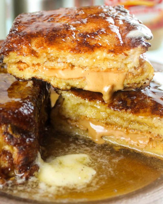 Hong Kong French Toast will definitely surprise you! It’s thick-cut brioche bread schmeared with peanut butter to make sandwiches and then fried on all sides. OMG – it is HEAVENLY! I wasn’t sure about it until the first bite – then I couldn’t stop eating it! #frenchtoast #breakfast #brunch #comfortfood #foodie #foodblogger #recipesforyou