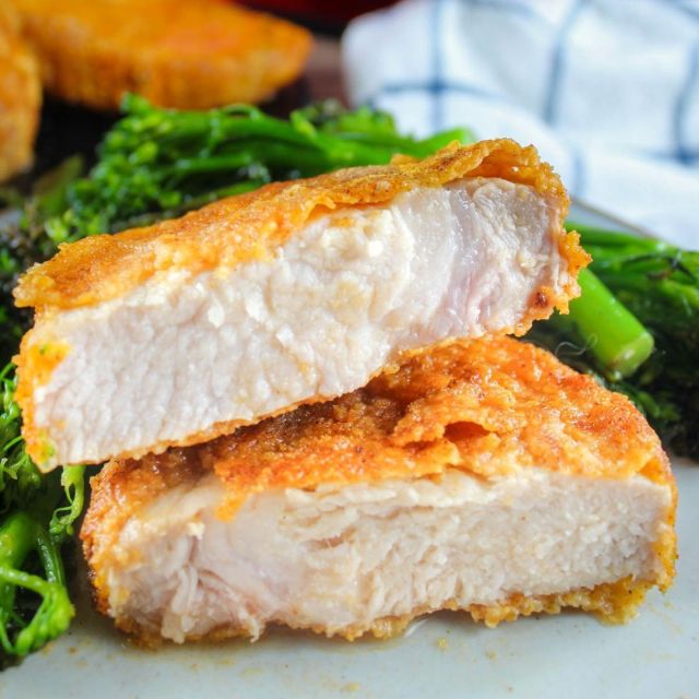 Air Fryer Shake N Bake Pork Chops are crisp on the outside and juicy on the inside! Plus - they're super easy to make. Just shake and b---air fry! #airfryer #airfryerrecipe #airfryerrecipes