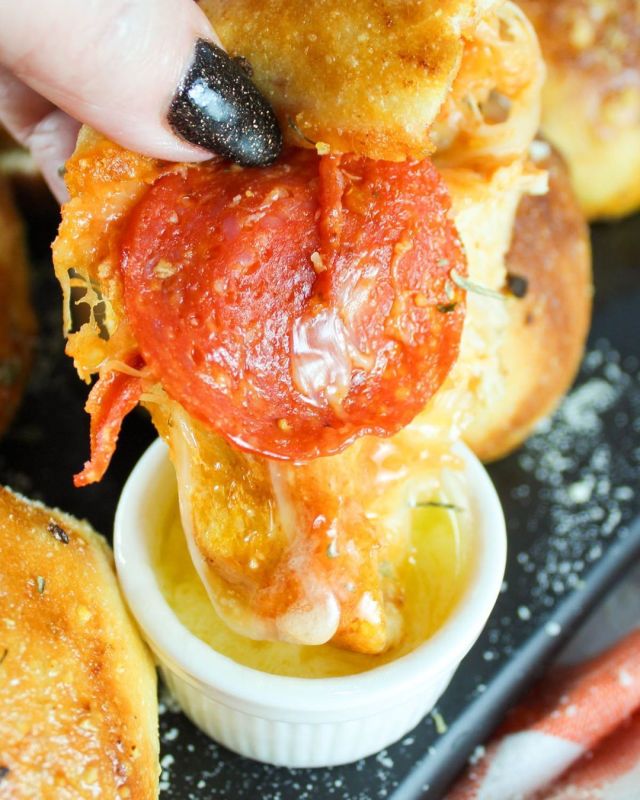 These Air Fryer Pizza Bites will be loved by kids and grown-ups alike at the dinner table. They're fun to pull apart and discover what's inside but also filling enough for the adults! These are filled to the brim with pizza sauce, pepperoni and lots of cheese! #airfryer #airfryerrecipe #airfryerrecipes https://buff.ly/3QFS6MM
