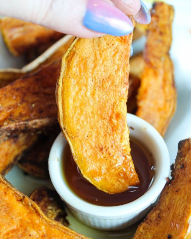 Air Fryer Sweet Potato Wedges are the perfect side dish for burgers, chicken or pork chops! They are crisp on the outside and fluffy on the inside with a comforting cinnamon spice mixture! #airfryer #airfryerrecipe #airfryerrecipes #sweetpotatoes https://buff.ly/3GbeQhC